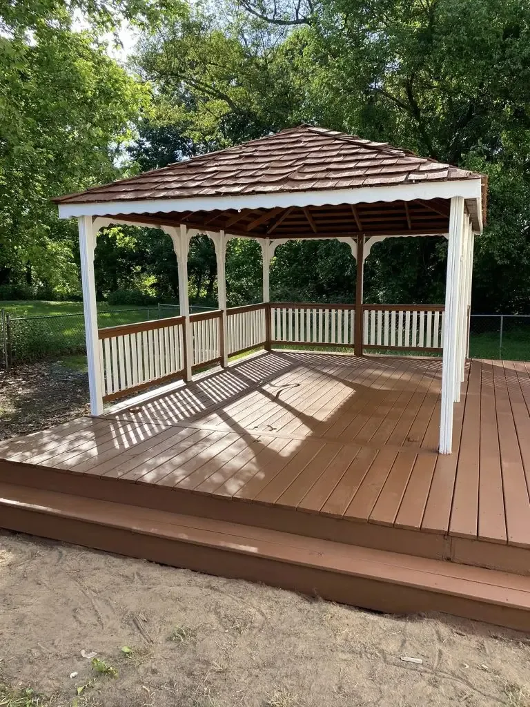 A wooden gazebo and deck painted in Camden county NJ